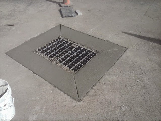 Concrete grate in the ground