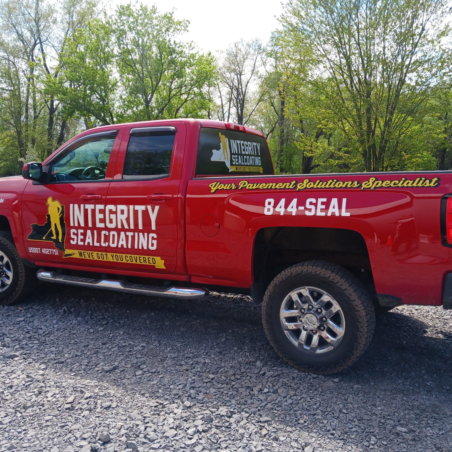 Integrity Sealcoating Red Truck Logo Rochester NY