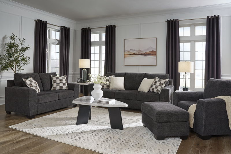 Loreo - 4 Pc. - Sofa, Loveseat, Chair, Ottoman - Ebony