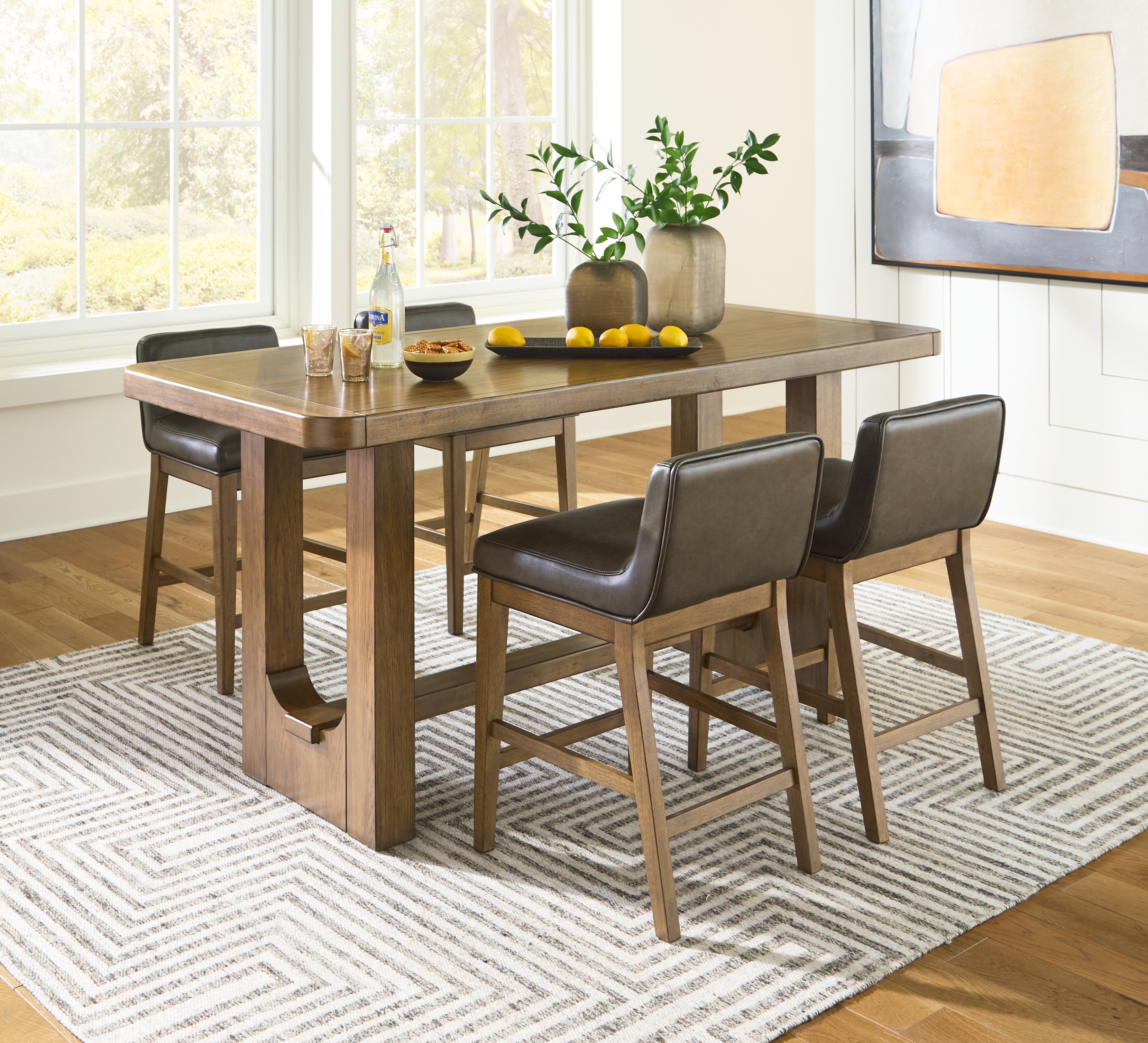 Cabalynn - 5 Pc. - Rectangular Dining Room Counter Table, 4 Upholstered Barstools - Light Brown