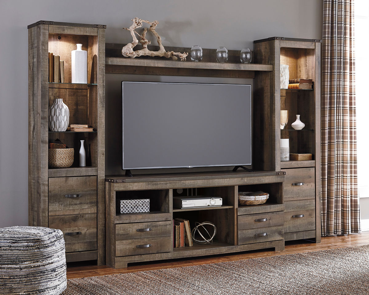 Trinell - 4 Pc. - Entertainment Center - 63" TV Stand - Brown