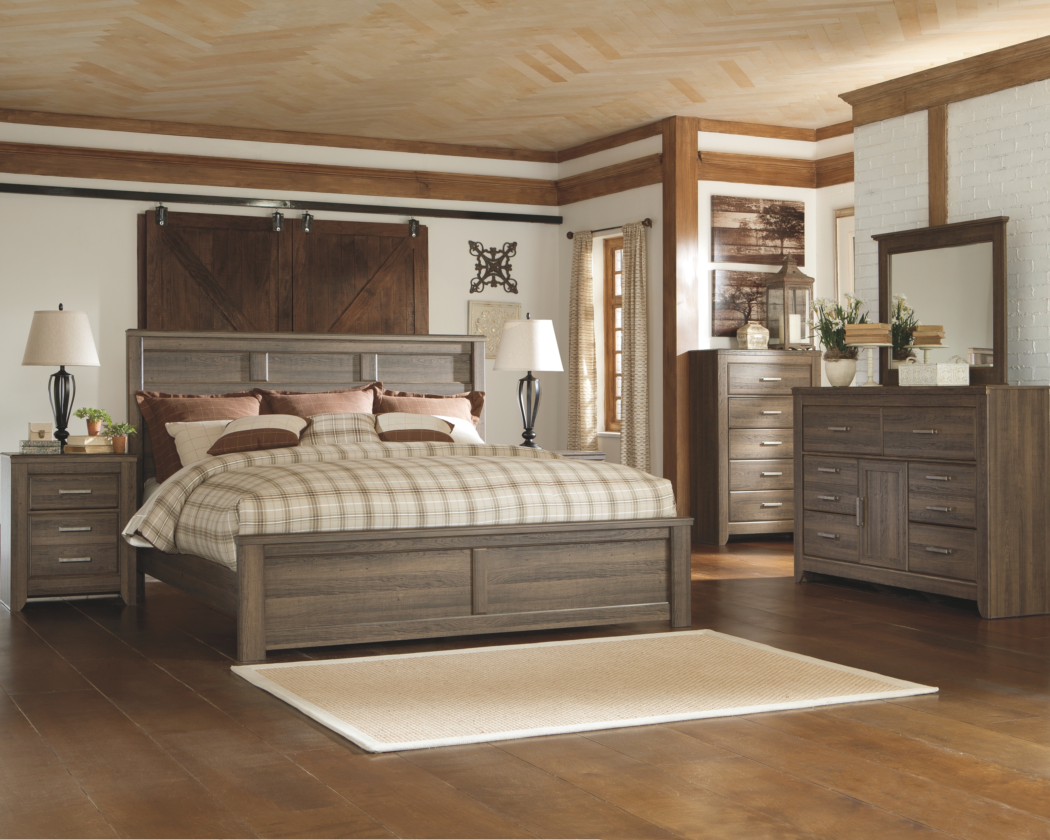 Juararo - 6 Pc. - Dresser, Mirror, Chest, California King Panel Bed - Dark Brown