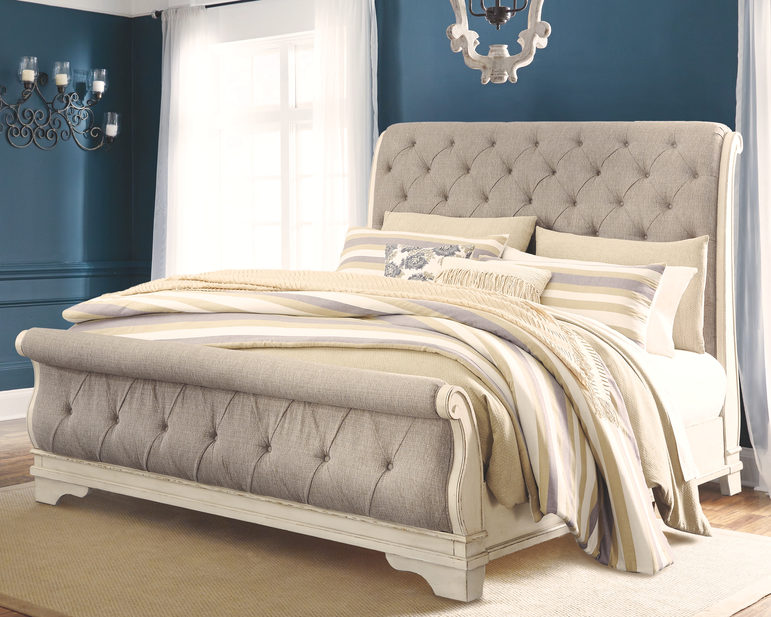 Realyn - California King Upholstered Sleigh Bed - Two-tone