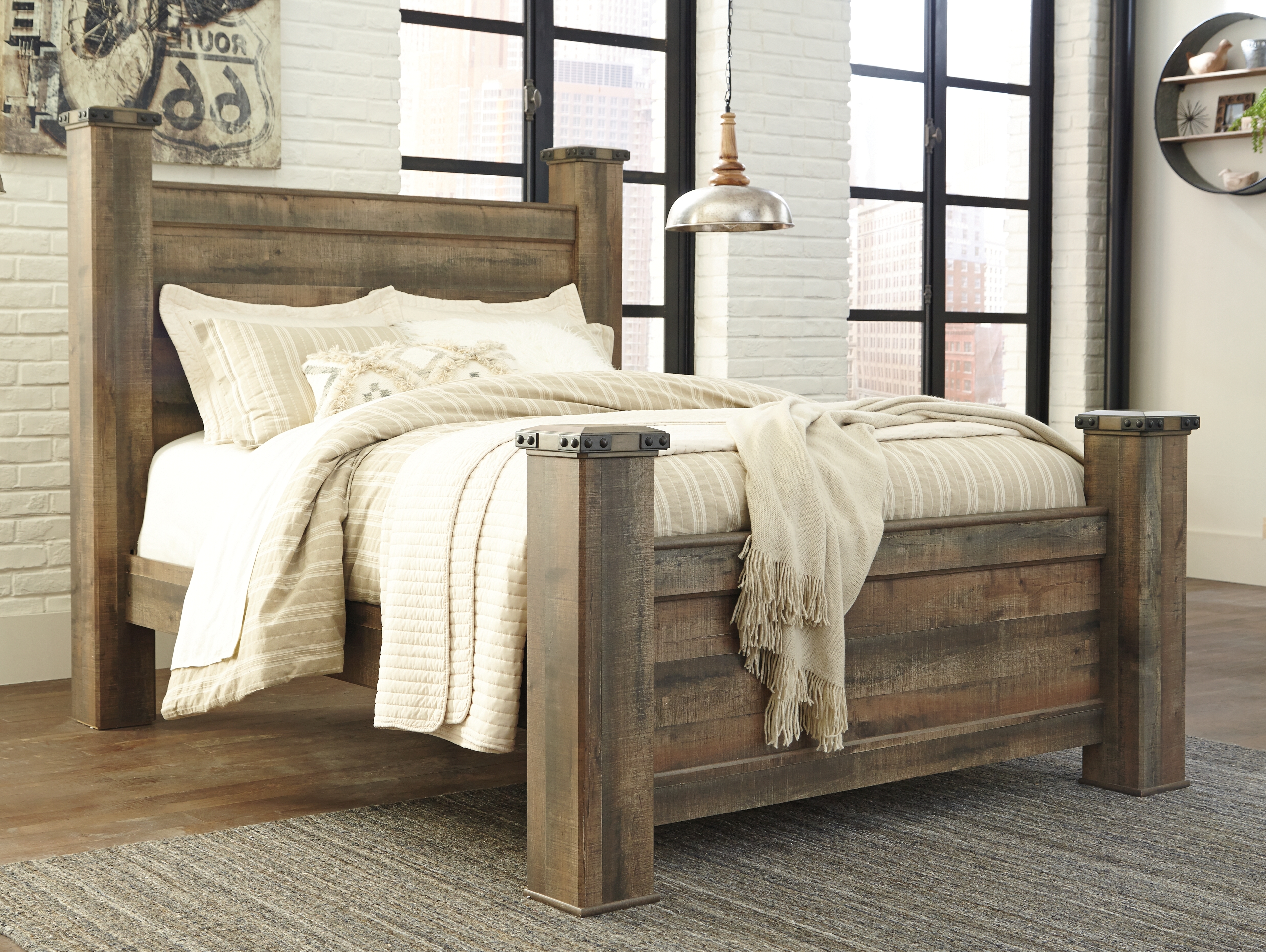 Trinell - Queen Poster Bed - Brown