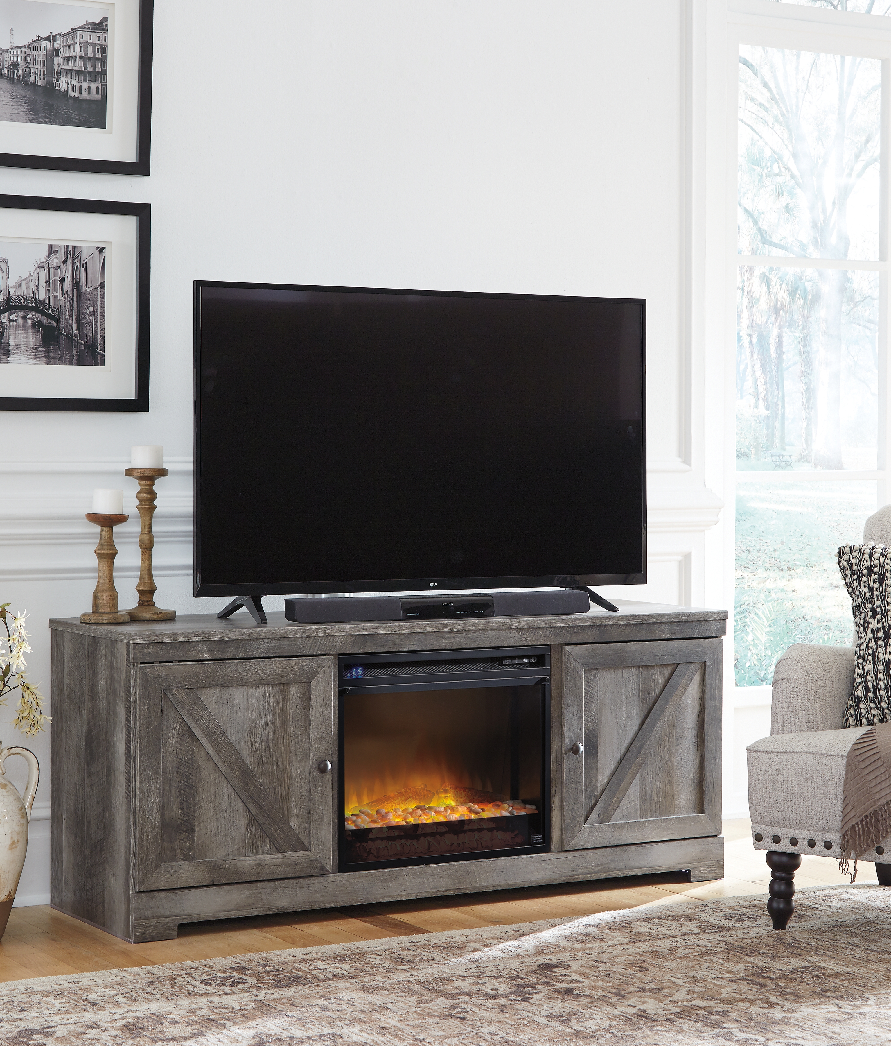 Wynnlow - 63" TV Stand With Glass/Stone Fireplace Insert - Gray