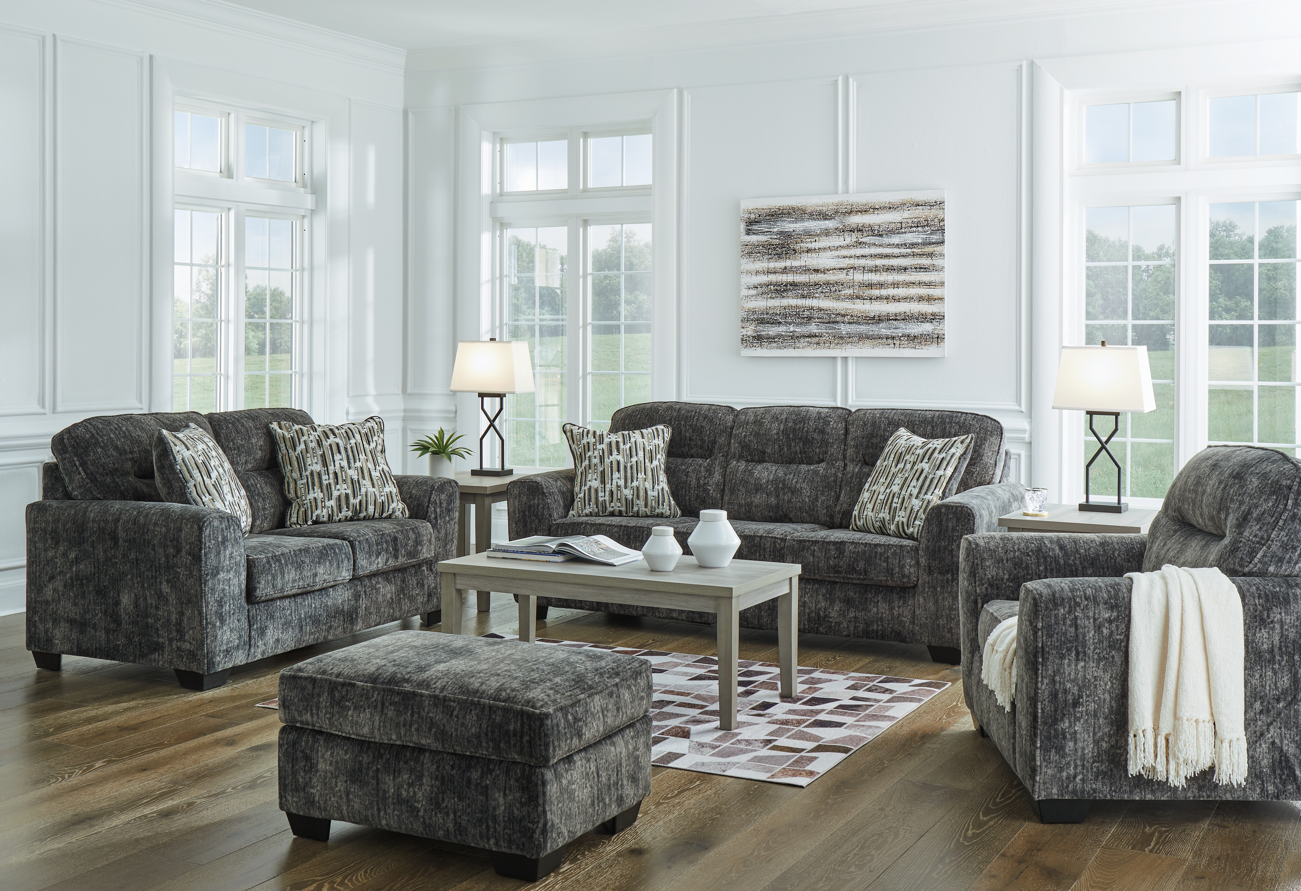 Lonoke - 4 Pc. - Sofa, Loveseat, Chair And A Half, Ottoman - Gunmetal