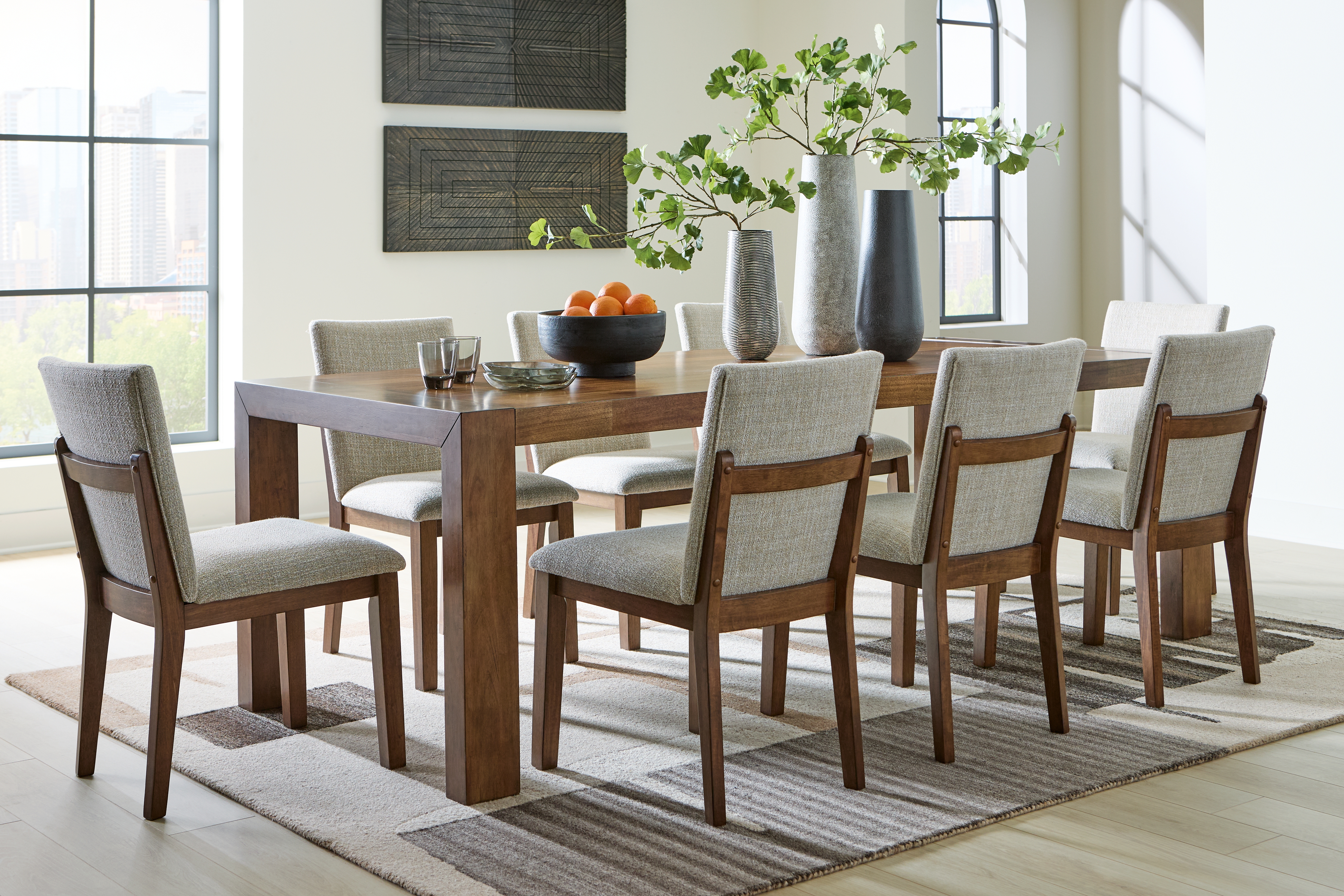 Kraeburn - 9 Pc. - Rectangular Dining Table, 8 Chair - Brown