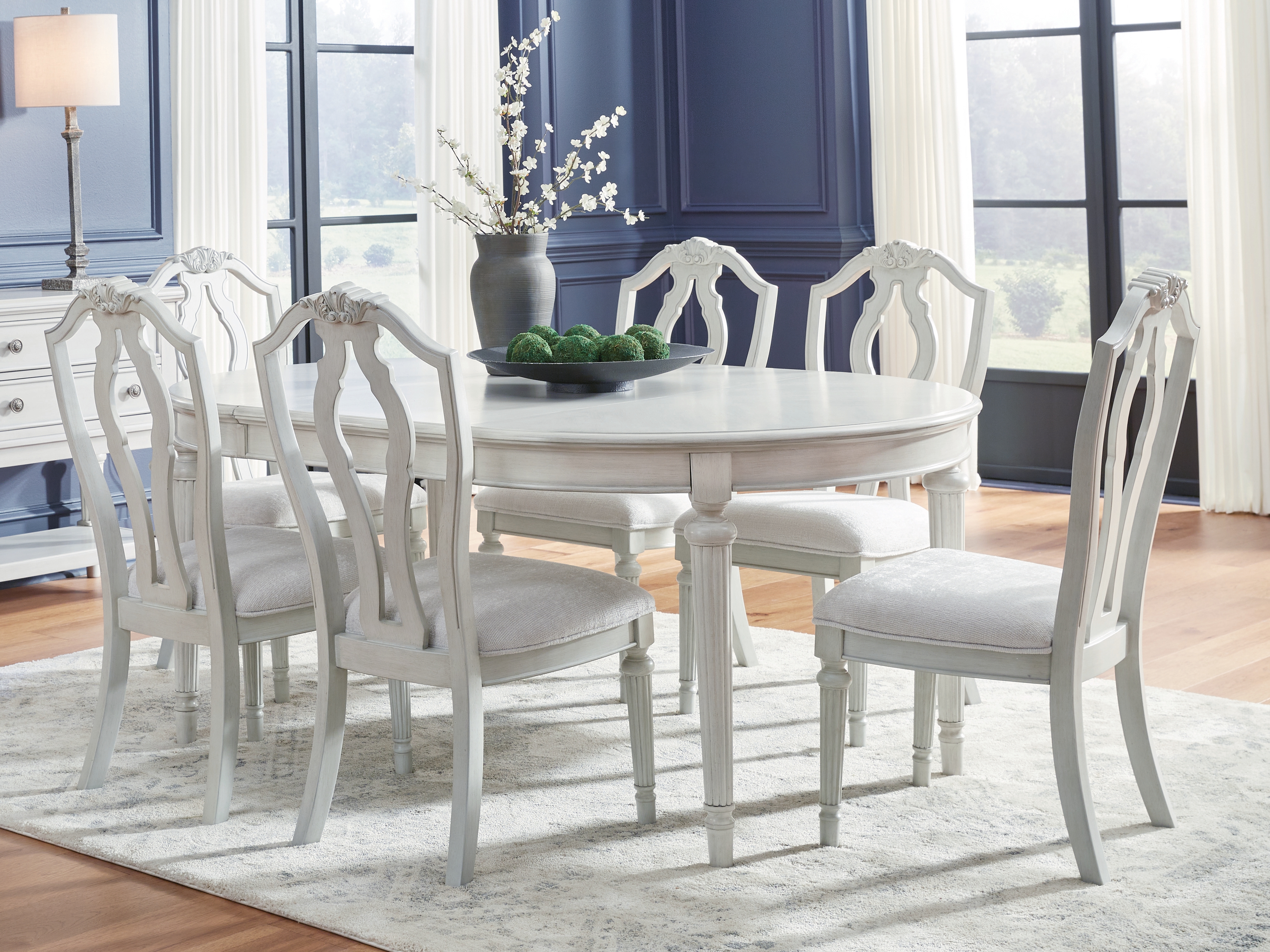 Montelaine - 8 Pc. - Dining Room Extension Table, 6 Side Chairs, Server - Antique White