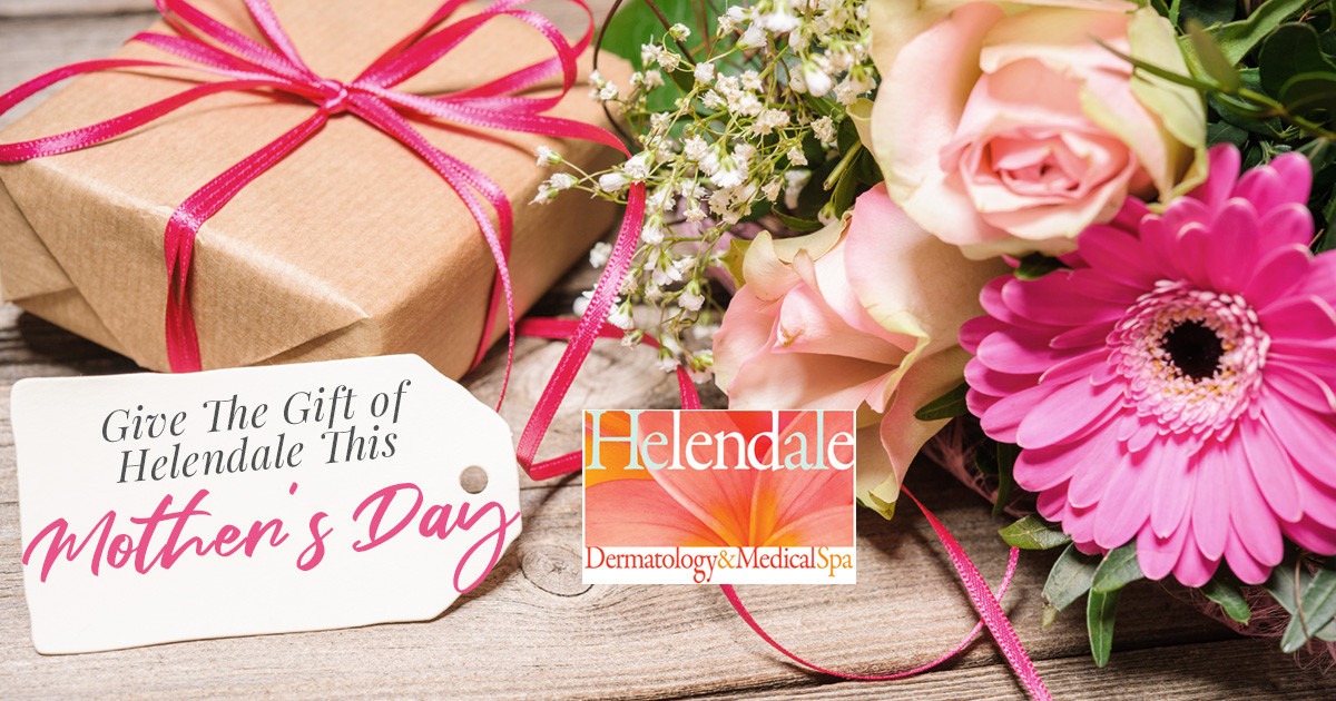 bouquet of flowers with brown paper wrapped gift