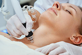 Woman having a medical spa treatment done as she relaxes