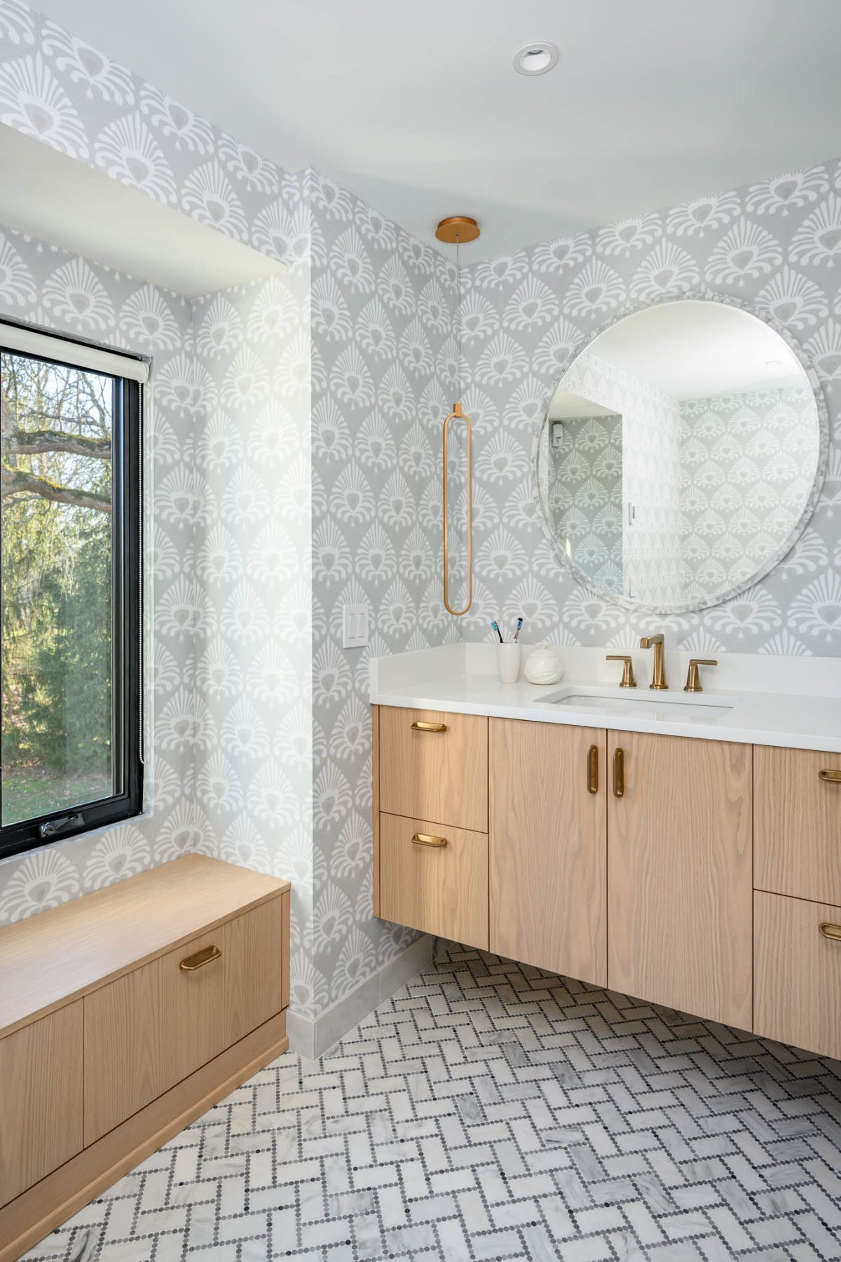 a room with a sink and a mirror