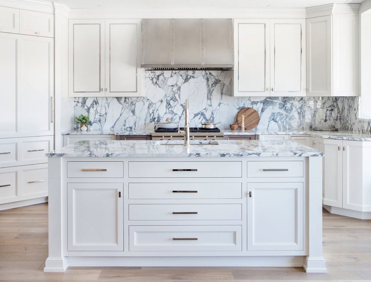 new kitchen white cabinets marble counter and backsplash