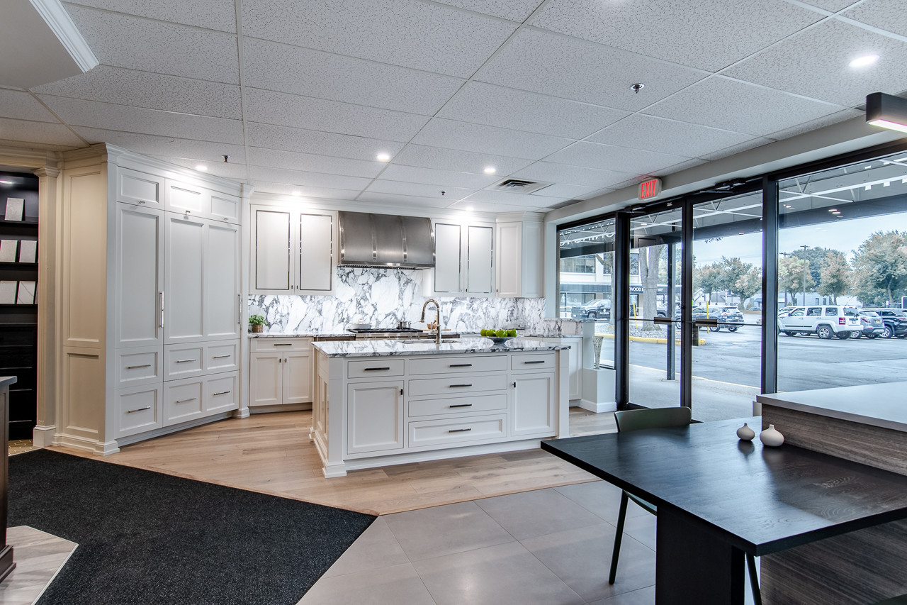 A storefront with a bright white kitchen display.