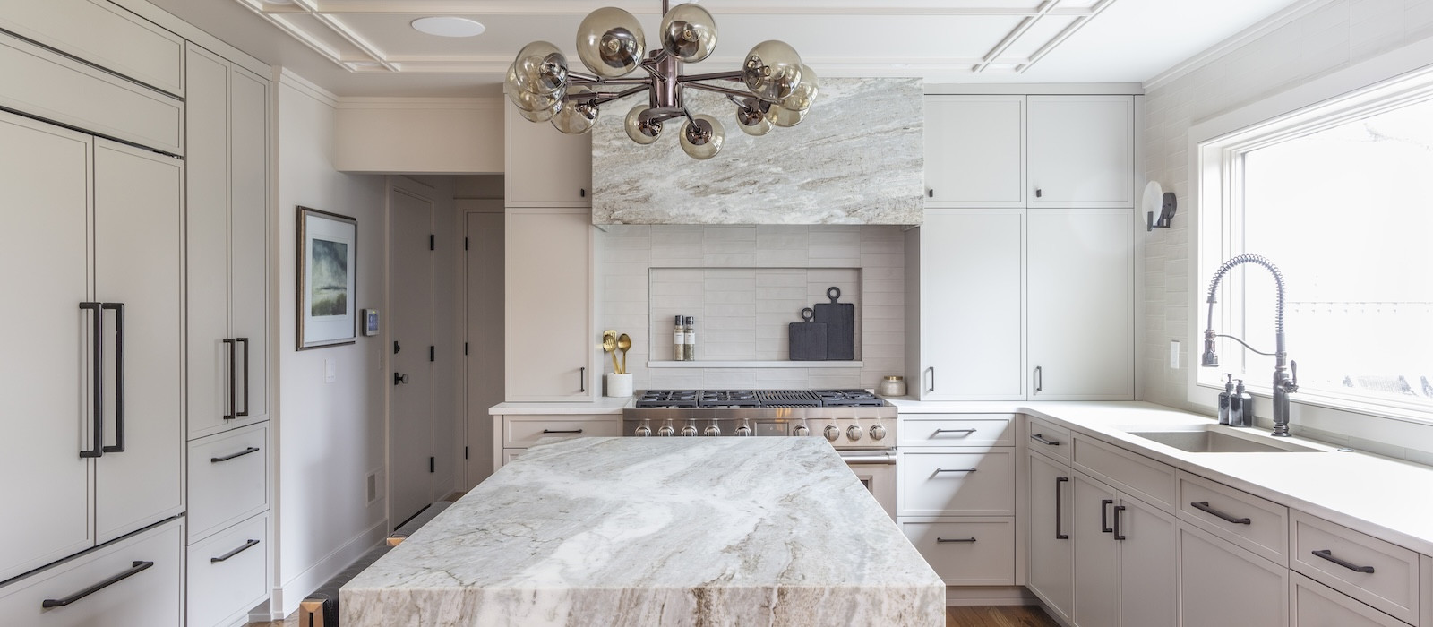 kitchen remodel large marble island gray cabinets