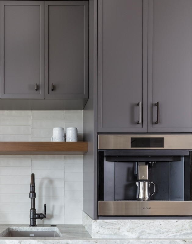 dark gray cabinets with coffee machine