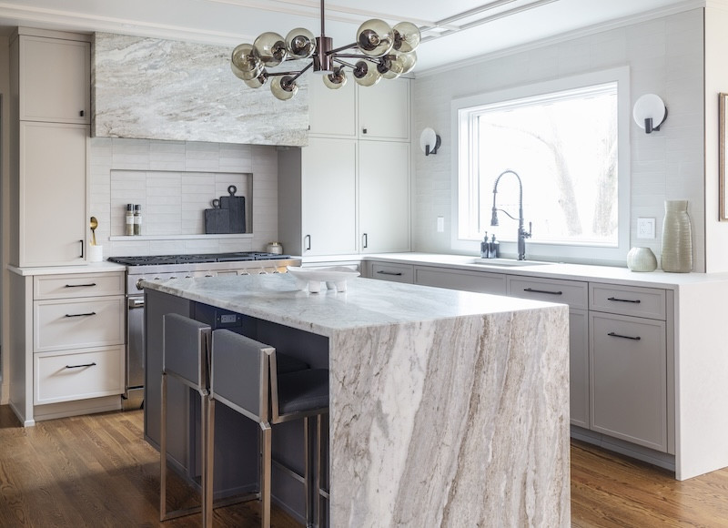 marble waterfall island gray kitchen