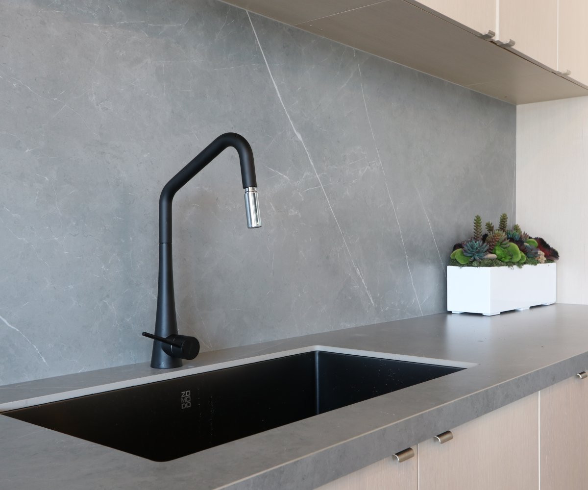 grey silestone countertop backsplash black sink and facuet