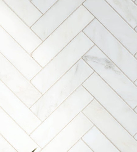 a room with a sink and a mirror