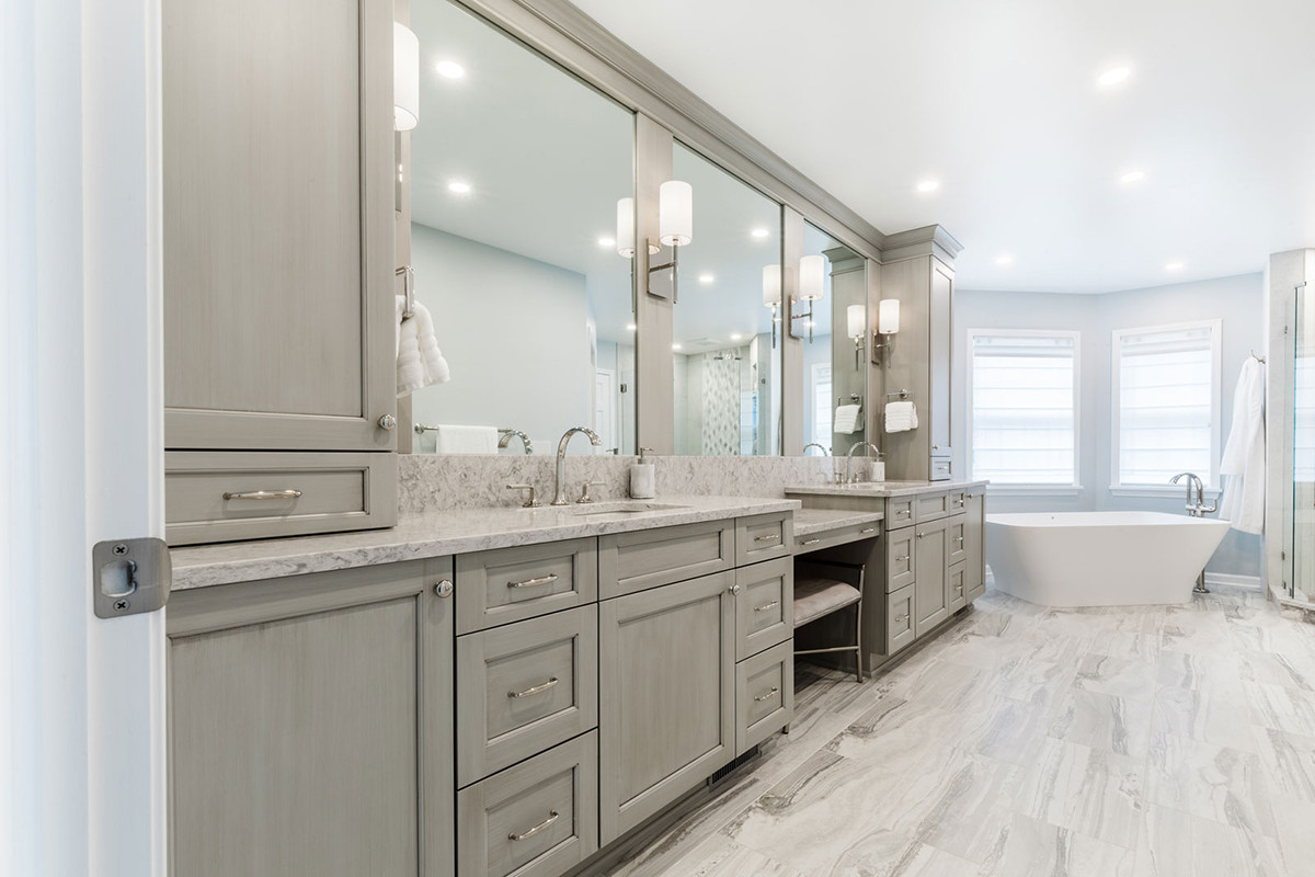 a room with a sink and a mirror