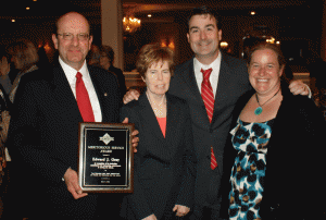 Edward J. Gray, recipient of the WNYAHSA Meritorious Service Award, with his wife Nancy, Kevin O'Neill from WGRZ-TV who served as the MC for the event, and Tammy Schmidt, WNYAHSA President.