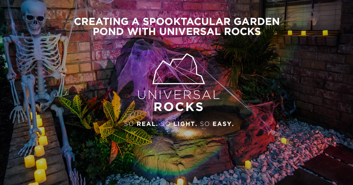 faux rock pond with waterfall and halloween decorations