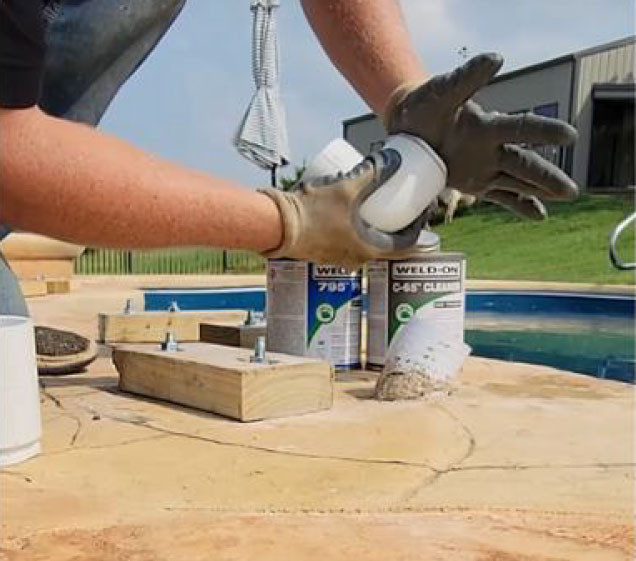 gluing pipe pieces for artificial rock waterfall swimming pool