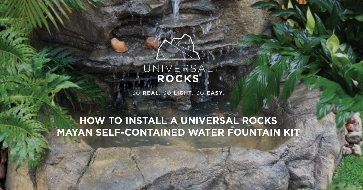 faux rock pond with waterfall in backyard