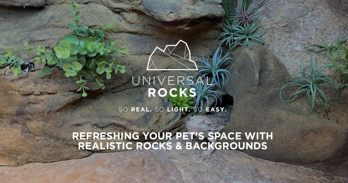 artificial rock reptile habitat with faux plants