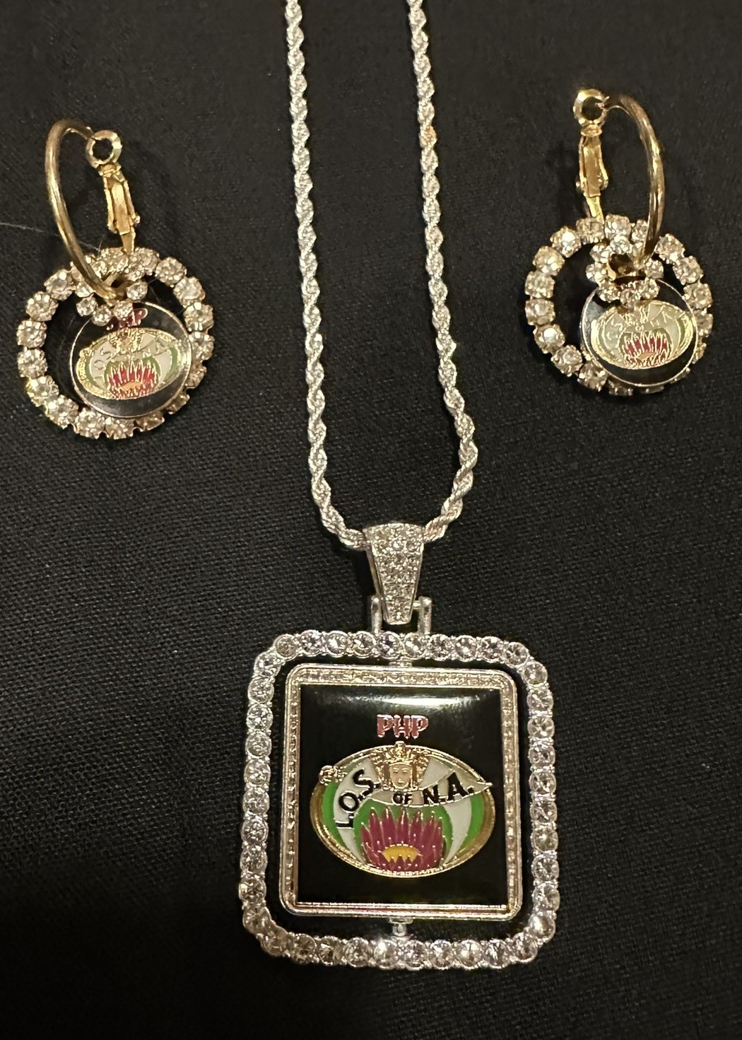 Reversible LOSNA and Lotus Flower Crystal Medallion  $89  (pendant only)