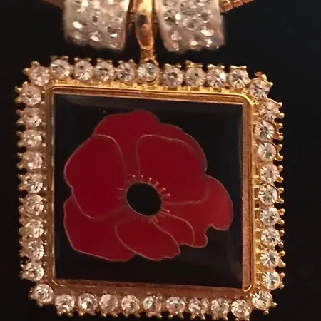 Poppy Medallion Set (includes 1 pair 1/2” nickelfree hoops, 1 pair extra large Swarovski Crystal, 1 pair extra small Swarovski Crystals, 1 pair poppies and 1 push and pull necklace)