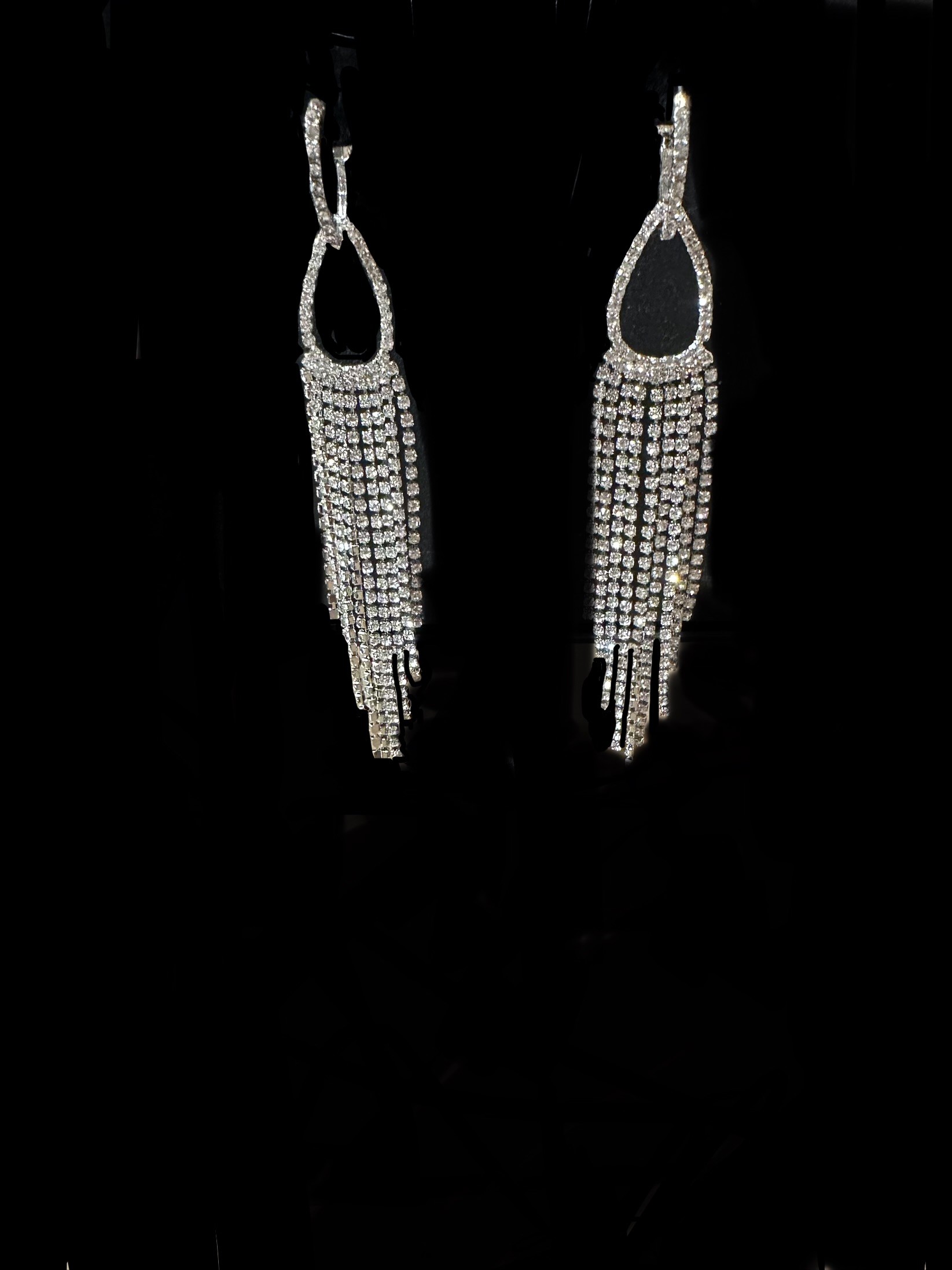 Flowing crystal earring set. $72 pair