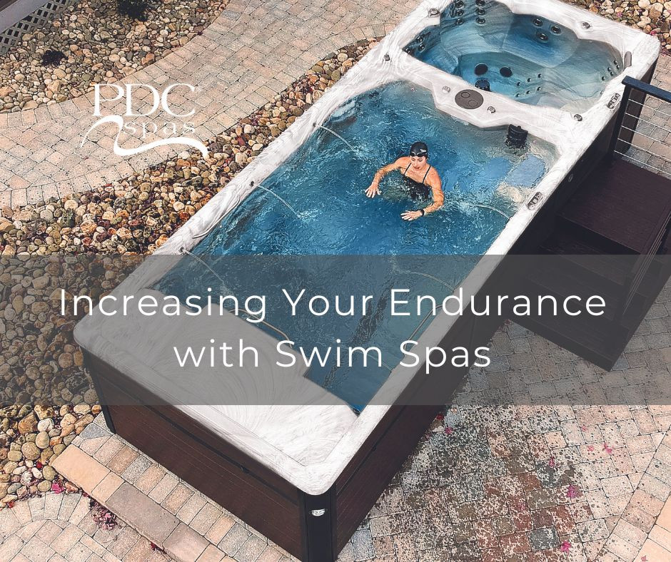 overhead image of a pdc spas truswim dual zone swim spa with a woman in black swim suit exercising