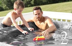 man and son in clean hot tub water
