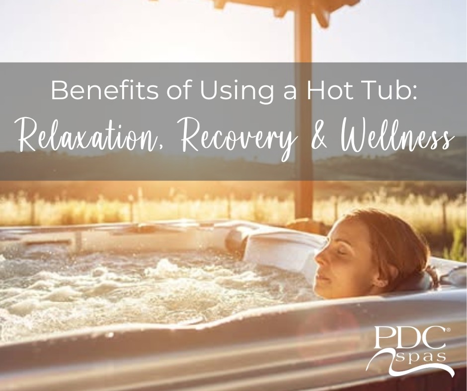 woman soaking in a pdc spas hot tub