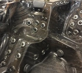 Captains chair in hot tub with jets