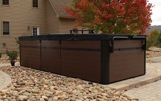 swim spa with dark cover and cover shelf