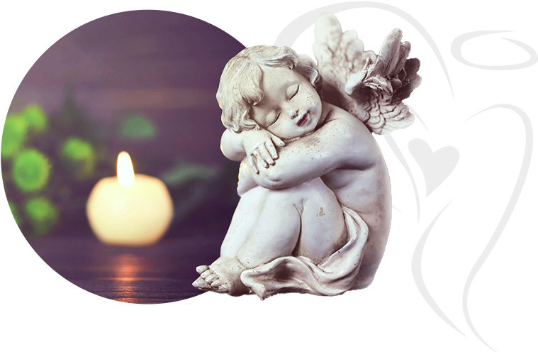 serene angel statue with folded arms next to a lit candle and green leaves