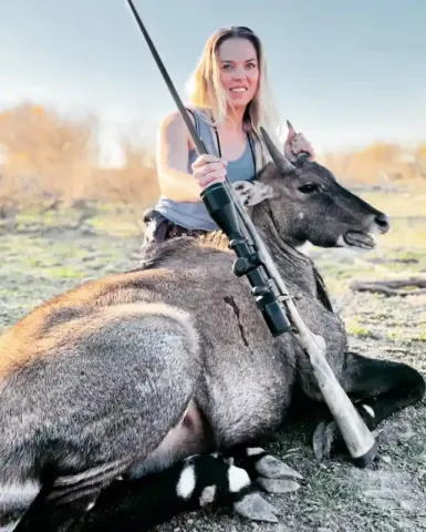 woman with nilgai trophy