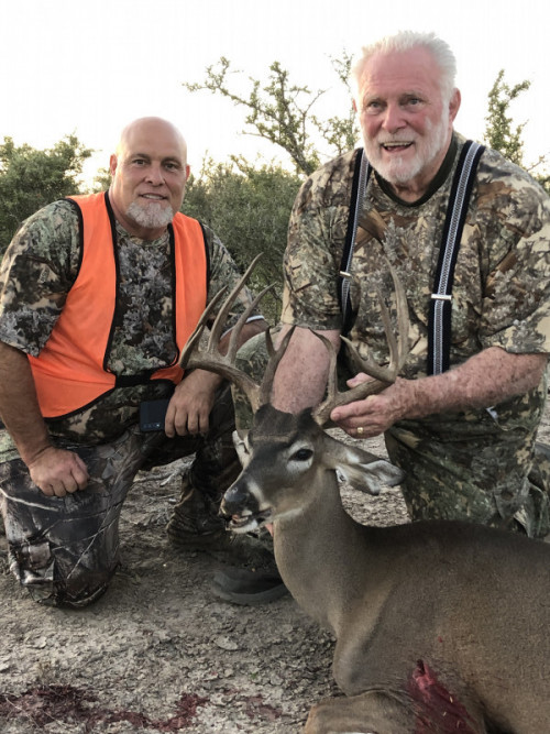 two hunters with whitetail trophy