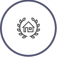 Two paw prints inside a dark blue circle on a white background.