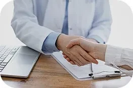 Two people shaking hands