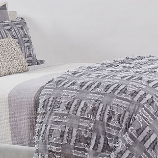 grey and beige textured bedding