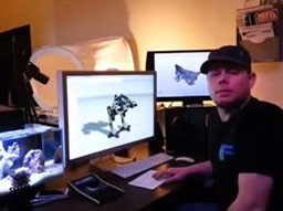 man sitting with 3d tech on computer