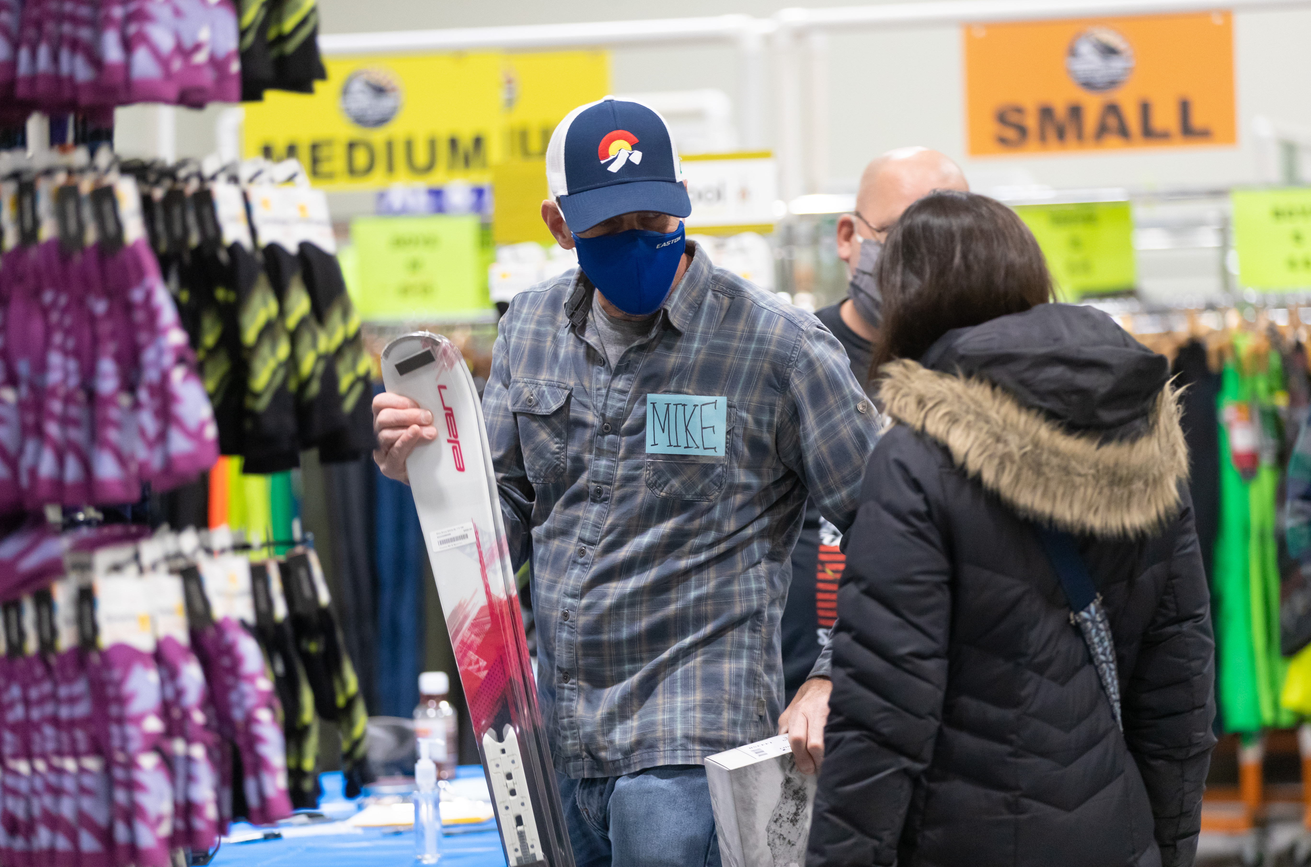 ski salesman and customer