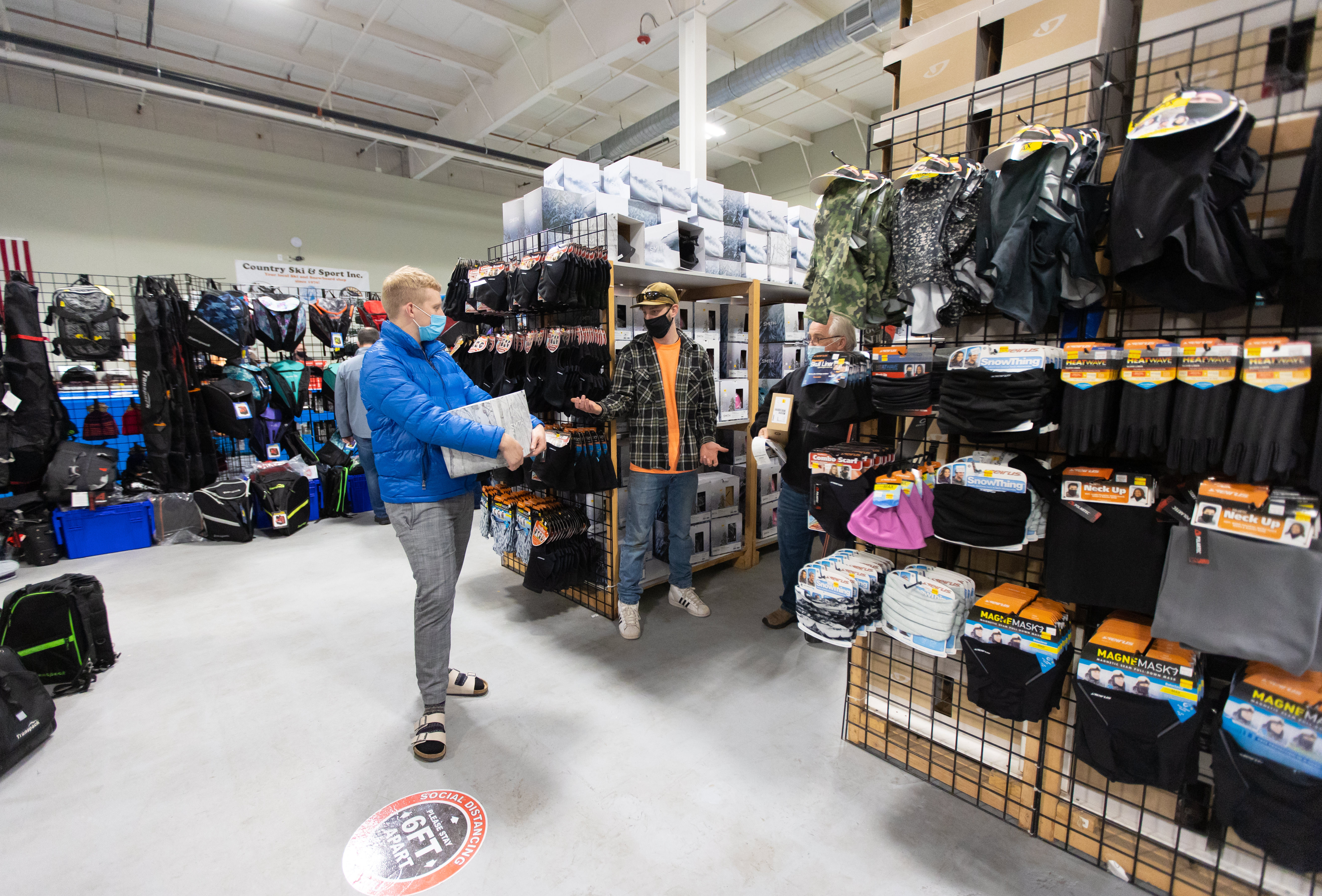 customer shopping at ski shop warehouse