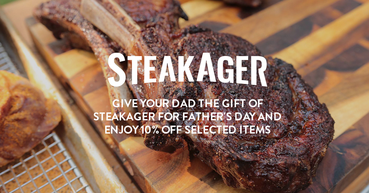 bone in steak on wooden cutting board