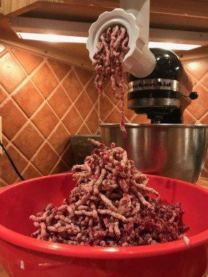 dry aged beef in meat grinder attachment