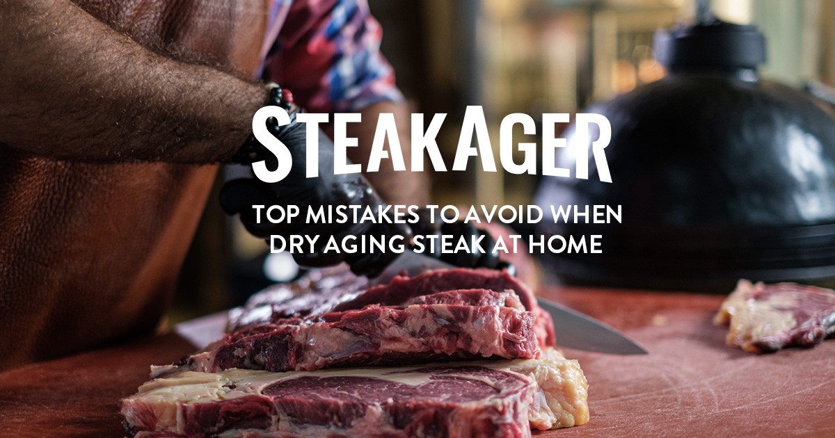 man wearing gloves cutting slabs of steak "top mistakes to avoid when dry aging steak at home"