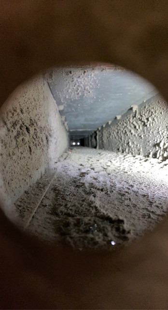 dirty ventilation duct before cleaning