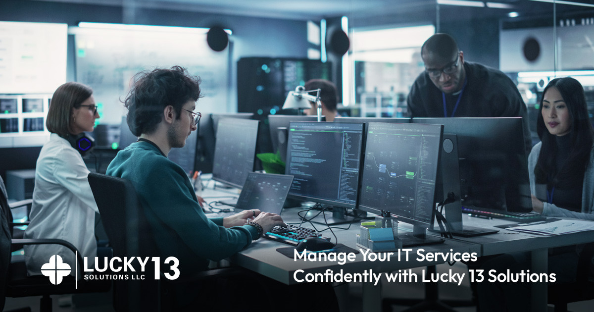 five tech employees working on computers